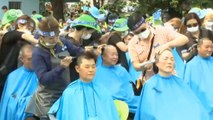 Güney Kore'de tıraşlı protesto