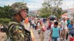 Desperate Venezuelans cross into Colombia to stock up on food & medicine