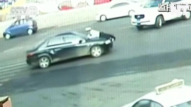 Policeman Clings to Hood of Car After Being Struck by Man High on Drugs