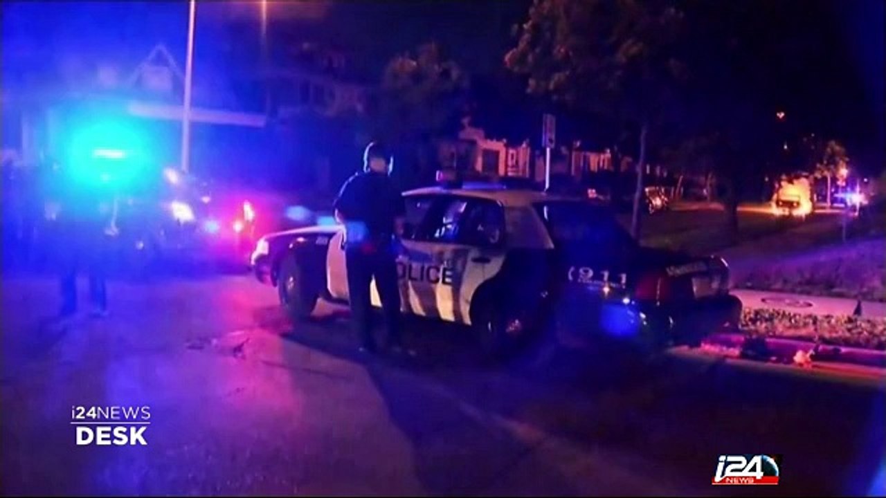 Milwaukee imposes curfew to quell rioting sparked by police shooting