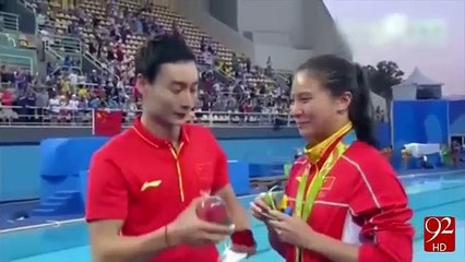 A marriage proposal at Olympics Medal Ceremony