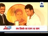 Gold coins bearing Sachin's face, signature launched