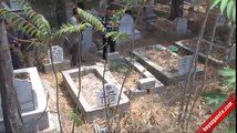 Üniversiteli kız iki günlük bebeğini babasının mezarına gömerek öldürdü
