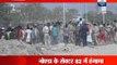 Noida: Salary issue turns violent between guard and labourers, 1 labourer shot