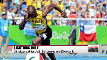 Скачать видео: Rio 2016: Usain Bolt cruises into 200m semis