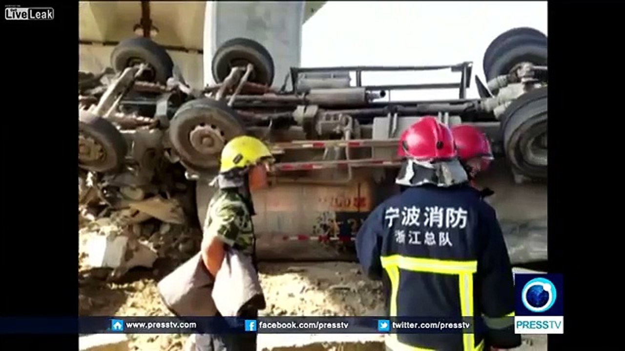 Car smashed by rolled over tanker, passengers miraculously survive