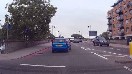 Deliveroo rider has a near miss with a pedestrian at a crossing
