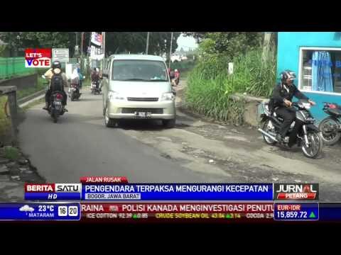 Banjir dan Hujan Deras Merusak Jalan Raya Muara Bogor