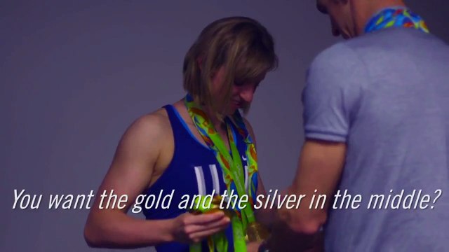 Michael Phelps arranges medals katie ladecky