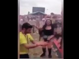 Shocking moment dancing festival goer is hit by unexpected wall of death