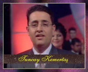 Tuncay KEMERTAŞ - Mavi Yelek Mor Düğme