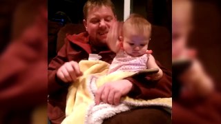 Baby Won't Let Go Of Dad's Phone