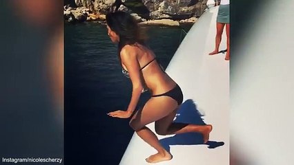 Nicole Scherzinger flaunts stunning figure in slo-mo dive video