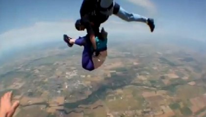 Lady Slips Out of Parachute When Skydiving