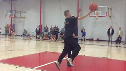 'The Professor' Schools Players At Basketball Clinic