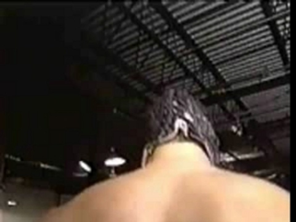 Rey Mysterio jumps off a balcony