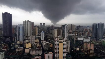 Tornado Over Buildings in Manila