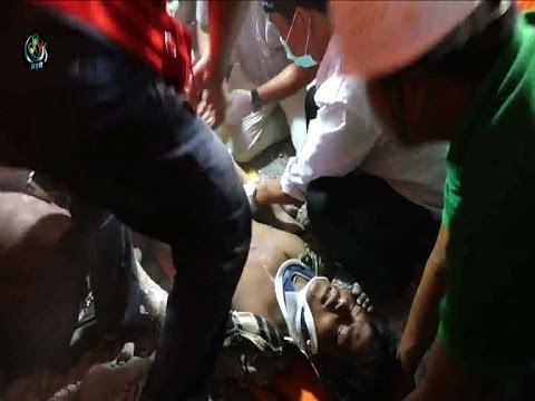 Construction worker freed 33 hours after deadly collapse