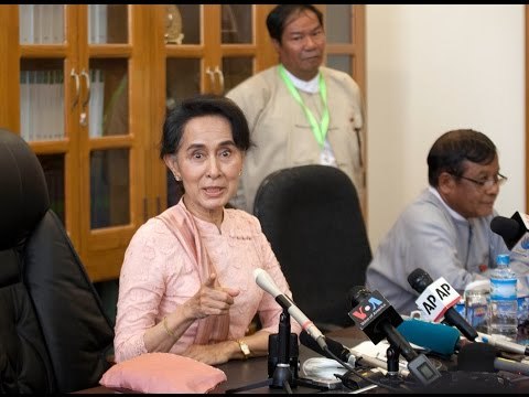 Suu Kyi upbeat ahead of crunch talks