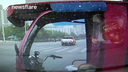 Driverless tricycle hit by car after running red light