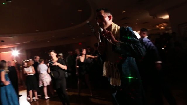 Bride and groom surprise guests with Indian wedding dance