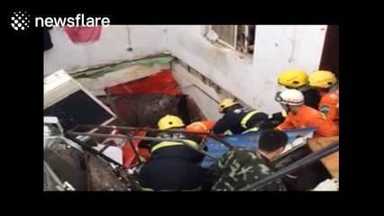 Firefighters rescue two people trapped in collapsed house