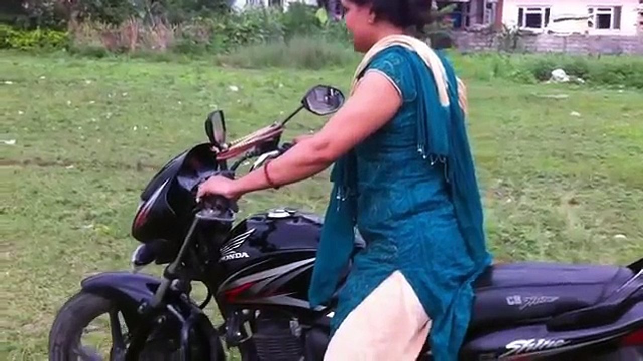 Desi Girl on Desi Bike