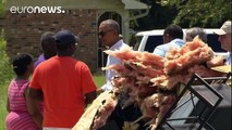 أوباما يزور لويزيانا المتضررة جراء الفيضانات