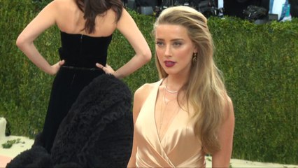 Maybe Sexy Amber Heard Is All About Love And Charity