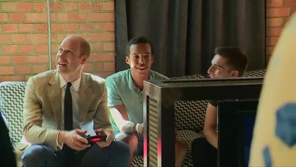 Prince William gets sporty and plays video games during visit