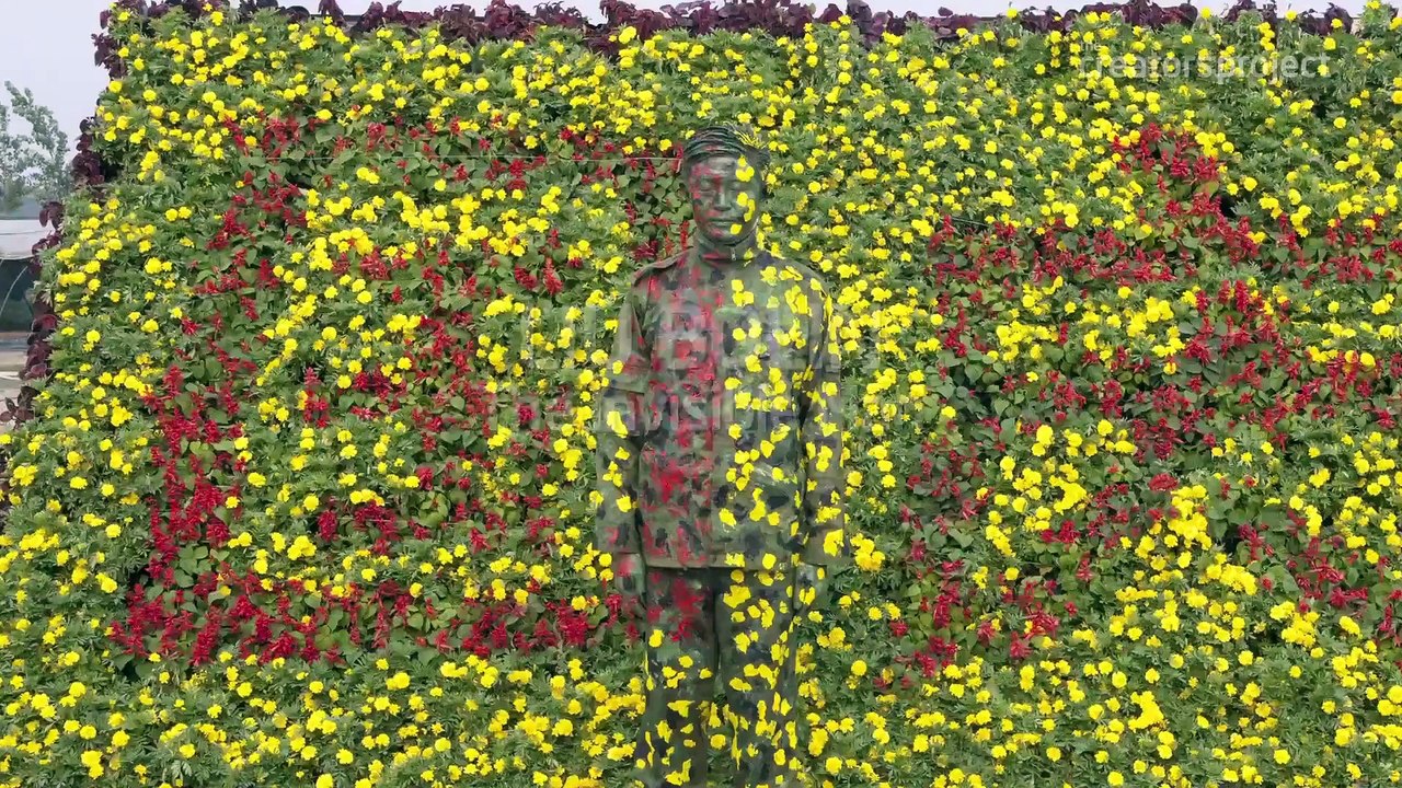 The Invisible Artist: Blending Into Liu Bolin's Paintings