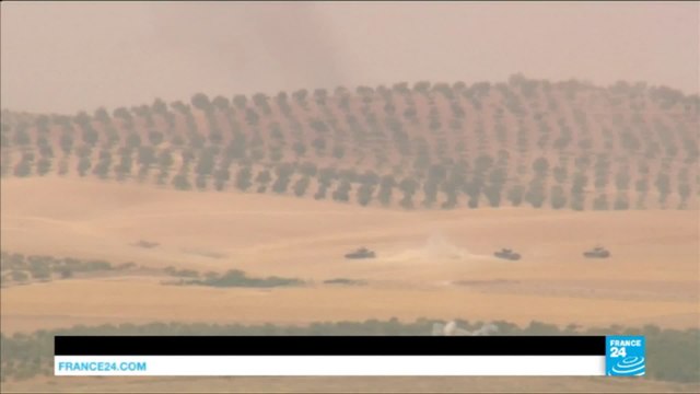 Syria: Turkey-backed say they seize Jarablus from Islamic state group, 10 more Turkish tanks sent