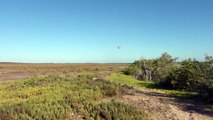 Helicopter flying around La Paz dunes