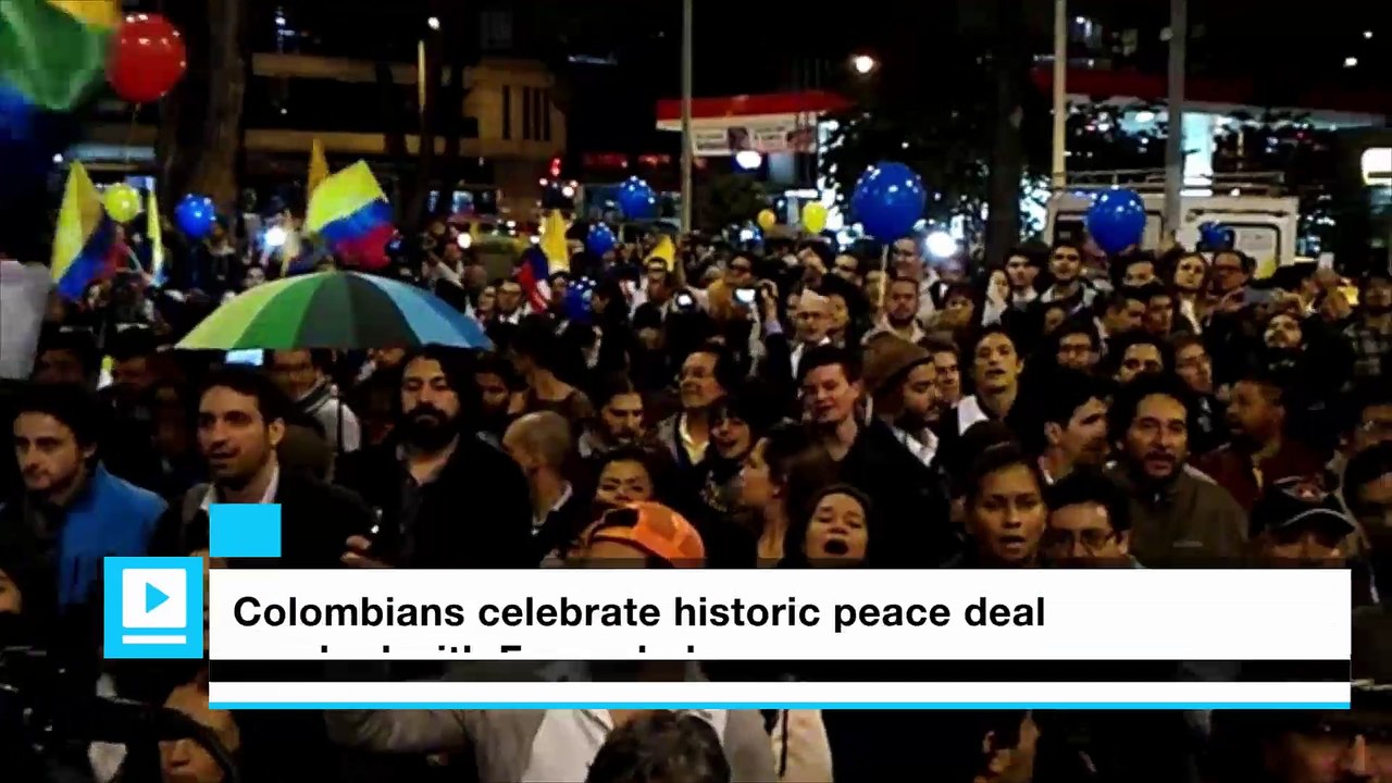 Colombians celebrate historic peace deal reached with FARC rebels