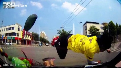 Delivery man gets hit by car at intersection