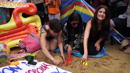 Women protest against 'burkini ban' in front on French embassy