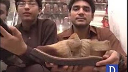Peshawar_ Shoemaker designs 'special chappal' for King Khan