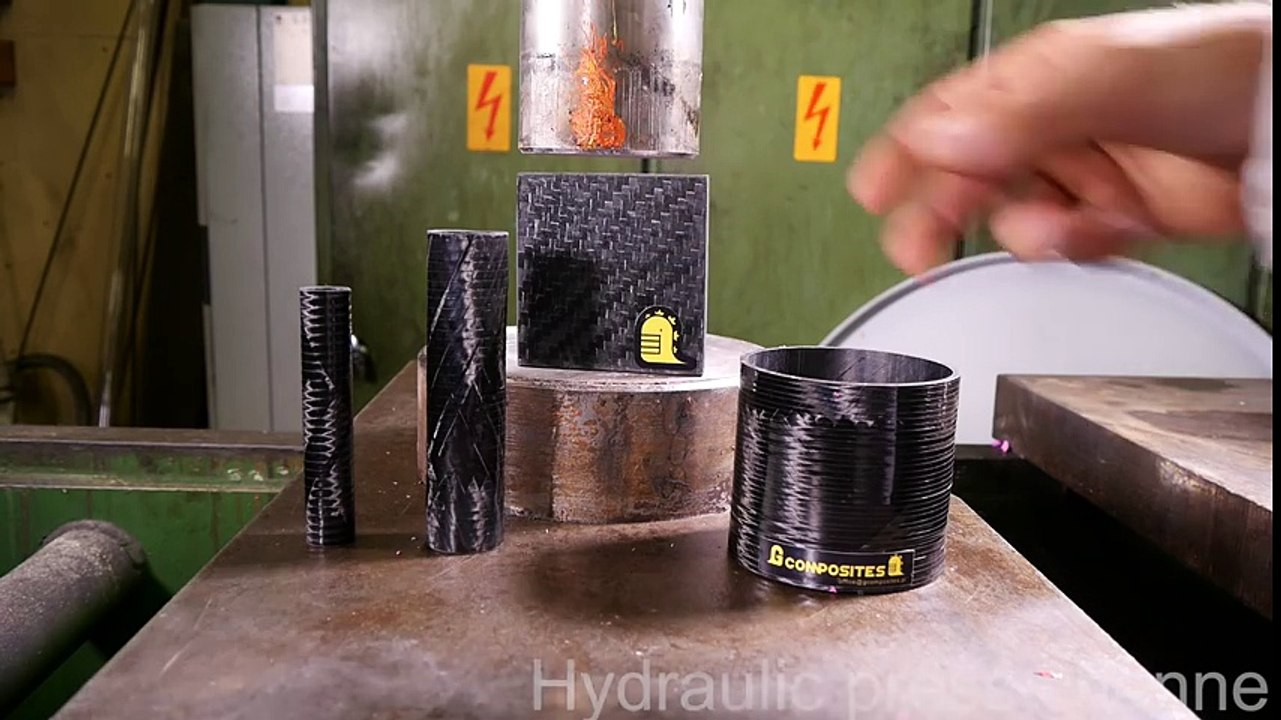 Crushing carbon fiber with hydraulic press