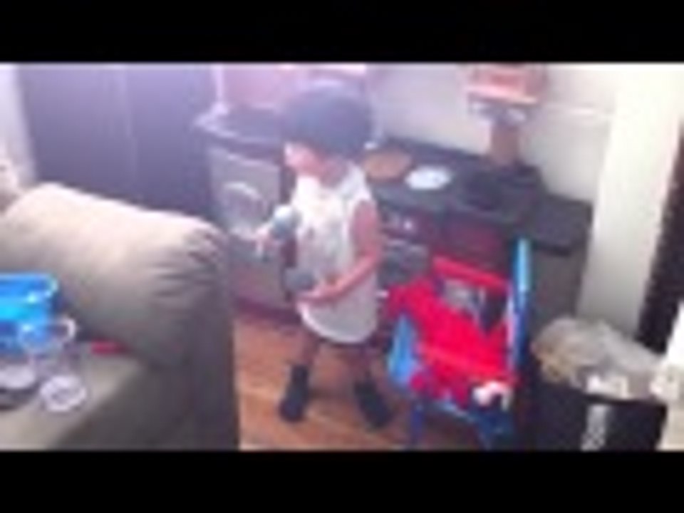 Liam singing with Grover