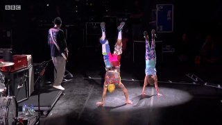 Red Hot Chili Peppers - We Will Rock You (Flea and Sunny handstand) [HD]