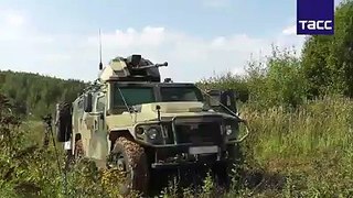 Russia's Remote Controlled (Tigr) Armored Vehicle Armed with a 30-mm gun shows fire power.