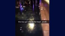 People giving CPR to a man shot and killed at Jeezy event