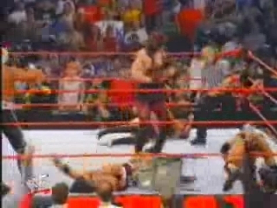 kane helps hogan and rock