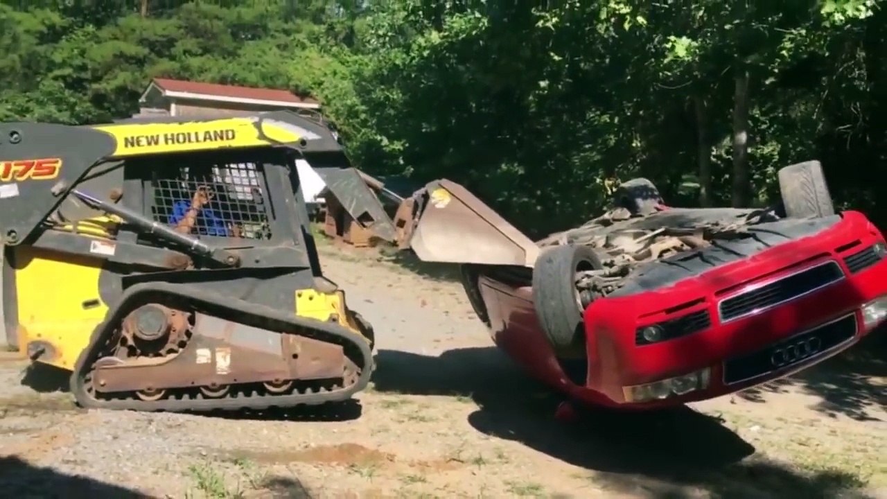 Raging dad 'crushes daughter's Audi with a digger