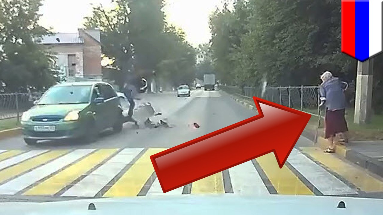Grandma witnesses motorcycle accident, goes immediately back to crossing the road - TomoNews