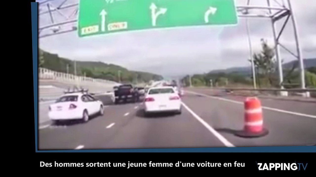 Etats-Unis : Des hommes sortent une jeune femme d'une voiture en feu