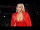Rita Ora 's BOOBS Almost Spills Out - WATCH