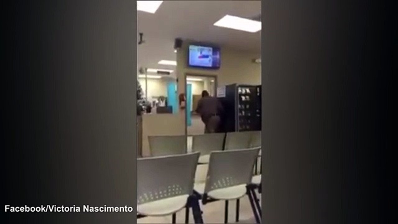 Woman attacking and fighting with cop