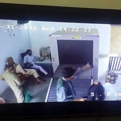 Security Check - Man Goes Through Scanner