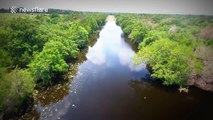 Drone explores a flooded road following storms